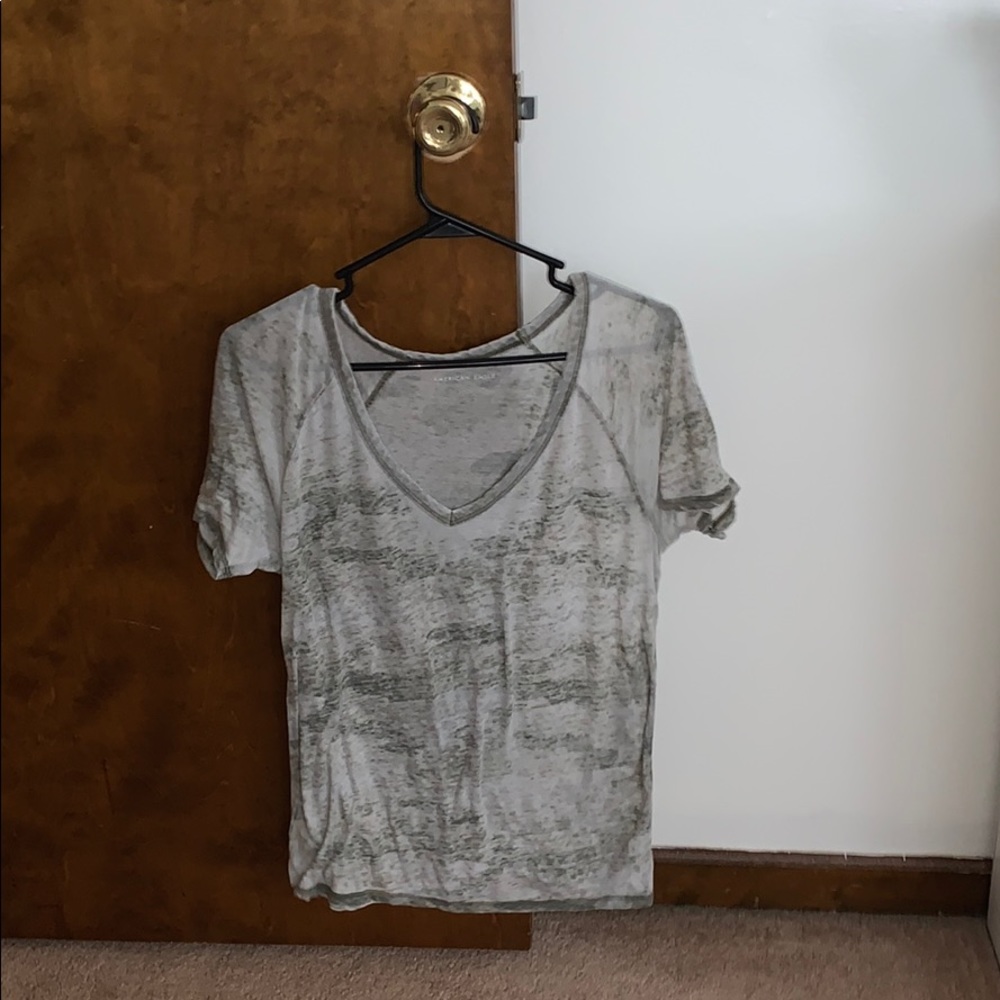 white and green camouflage american eagle top